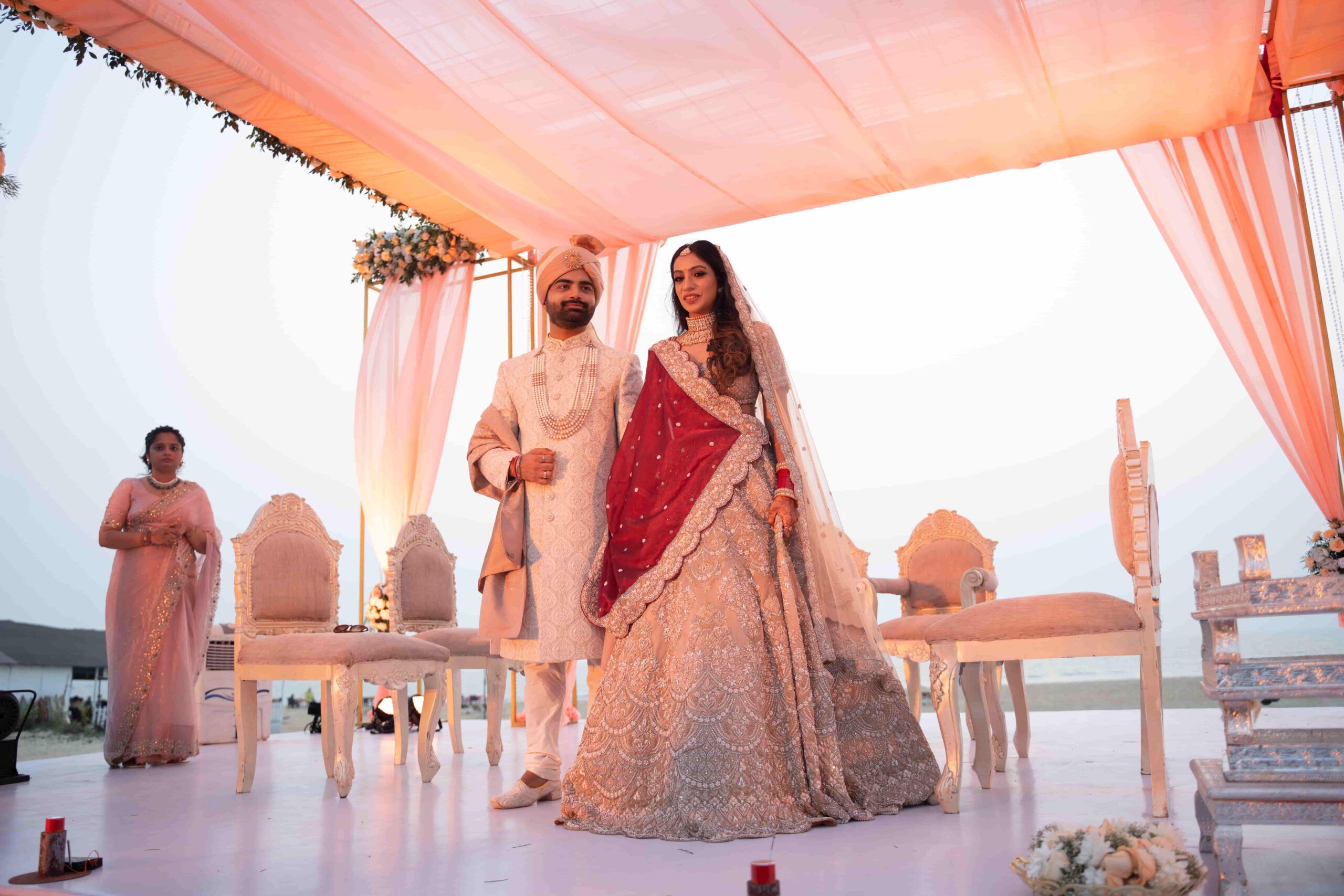 Groom admiring the bride as they pose .